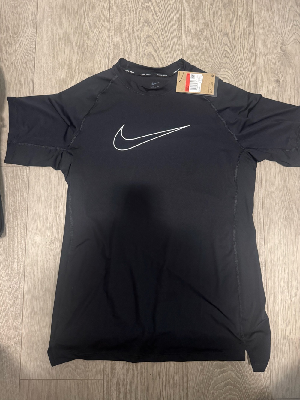 Nike Black Short-Sleeve Athletic Tee with White Swoosh